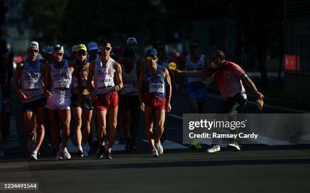 Hokkaido , Japan - 6 August 2021; The judge shows a yellow card during the men's 50 kilometre walk final at Sapporo Odori Park on day 14 during the...