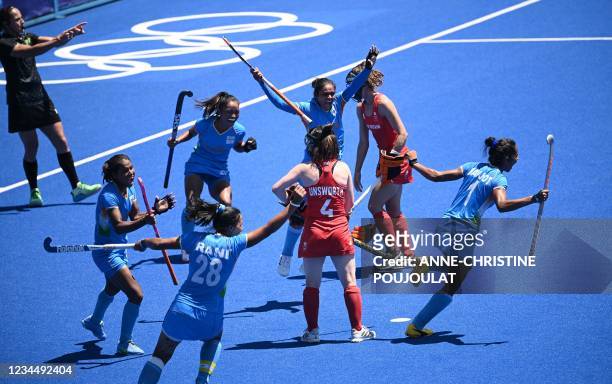 Players of India celebrate after teammate Gurjit Kaur scored the second goal against Britain during the women's bronze medal match of the Tokyo 2020...