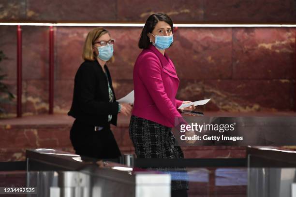 Premier Gladys Berejiklian and Chief Health Officer Dr Kerry Chant arrive at a press conference to provide a COVID-19 update in Sydney. Friday,...