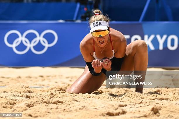 S April Ross celebrates winning in their women's beach volleyball final match between Australia and the USA during the Tokyo 2020 Olympic Games at...