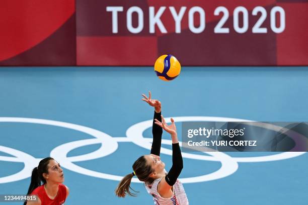 Serbia's Maja Ognjenovic sets the ball in the women's semi-final volleyball match between USA and Serbia during the Tokyo 2020 Olympic Games at...