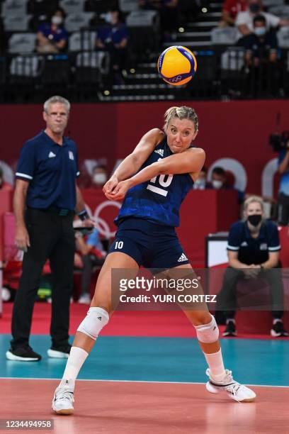 S Jordan Larson hits the ball in the women's semi-final volleyball match between USA and Serbia during the Tokyo 2020 Olympic Games at Ariake Arena...