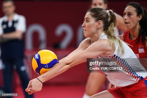 Serbia's Bianka Busa hits the ball in the women's semi-final volleyball match between USA and Serbia during the Tokyo 2020 Olympic Games at Ariake...