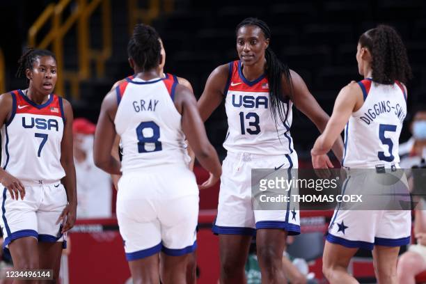 S Ariel Atkins, Chelsea Gray, Sylvia Fowles and Skylar Diggins react during the women's semi-final basketball match between USA and Serbia during the...