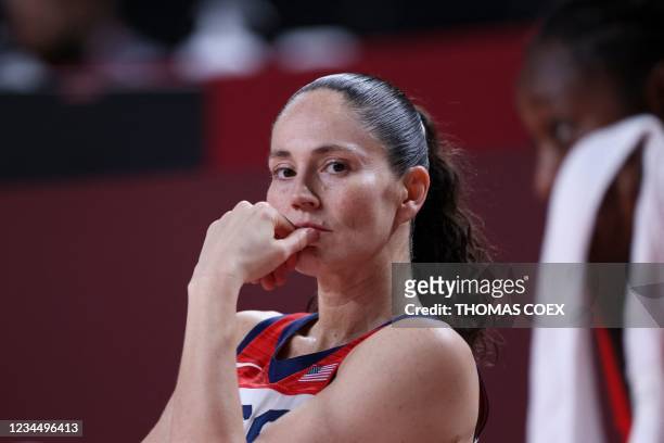 S Sue Bird looks from the bench during in the women's semi-final basketball match between USA and Serbia during the Tokyo 2020 Olympic Games at the...