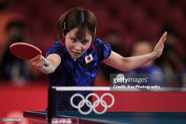 Miu Hirano of Team Japan hits the ball at 2nd single match of Table Tennis Women's Team Final on day thirteen of the Tokyo 2020 Olympic Games at...