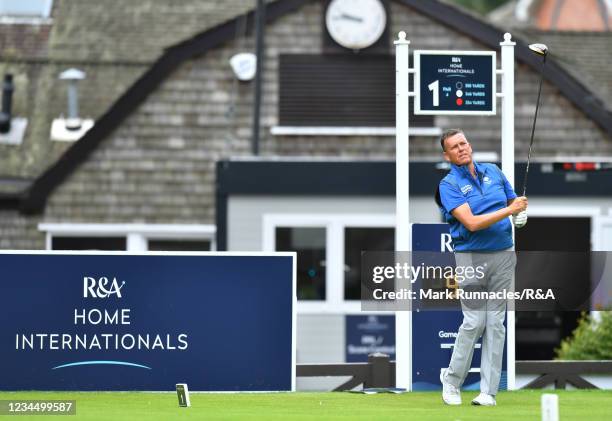 Stewart Henderson of Scotland plays his tee shot at the 1st hole during the R&A Women's Senior and Men's Senior Home Internationals at the Hotchkin...