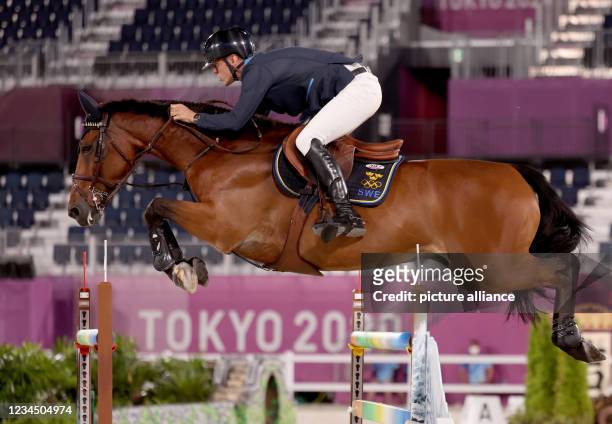 August 2021, Japan, Tokio: Equestrian Sport/Jumping: Olympics, preliminaries, team, qualifying at Equestrian Park. Peder Fredricson from Sweden on...