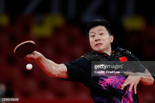 Ma Long of Team China in action during his Men's Team Gold Medal table tennis match on day fourteen of the Tokyo 2020 Olympic Games at Tokyo...