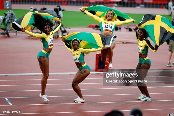 Team Jamaica jump for the cameras during the Women's 4 x 100m Relay Final on Day 14 of the Tokyo 2020 Olympic Games at Olympic Stadium on August 06,...