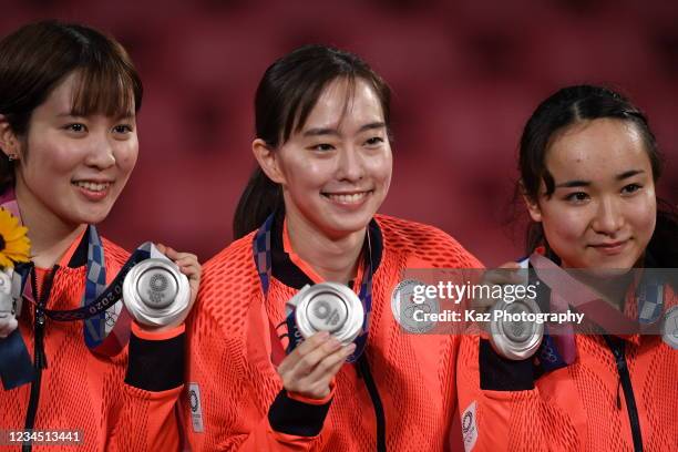 Mima Ito, Kasumi Ishikawa and Miu Hirano of Japan with Silver Medal at victory ceremony of Table Tennis Women's Team on day thirteen of the Tokyo...