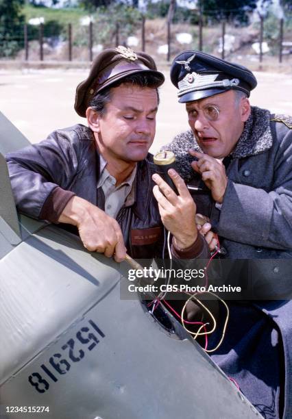 Pictured is Bob Crane as Colonel Robert Hogan, Werner Klemperer as Colonel Wilhelm Klink in the HOGAN'S HEROES episode, "Is General Hammerschlag...