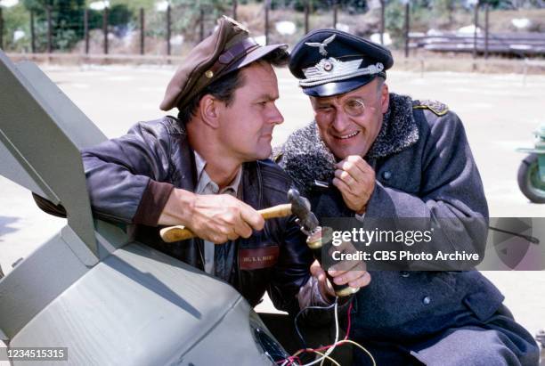 Pictured is Bob Crane as Colonel Robert Hogan, Werner Klemperer as Colonel Wilhelm Klink in the HOGAN'S HEROES episode, "Is General Hammerschlag...
