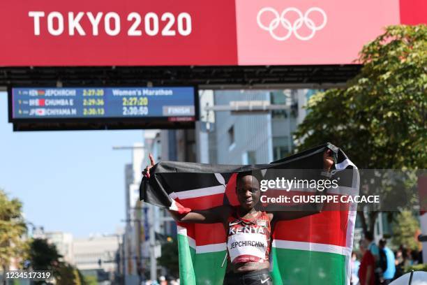 Kenya's Peres Jepchirchir celebrates after winning the women's marathon final during the Tokyo 2020 Olympic Games in Sapporo on August 7, 2021.