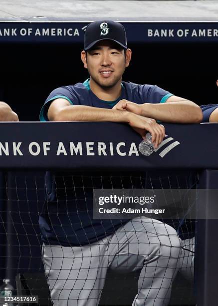 Yusei Kikuchi of the Seattle Mariners looks on from the dugout against the New York Yankees during the fifth inning at Yankee Stadium on August 6,...