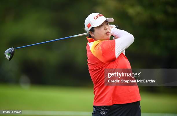 Saitama , Japan - 7 August 2021; Shanshan Feng of China watches her drive from the fifth tee box during round four of the women's individual stroke...