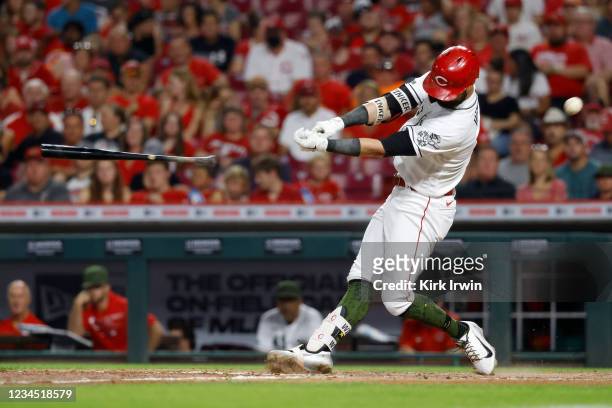Jesse Winker of the Cincinnati Reds looses control of his bat while batting during the sixth inning of the game against the Pittsburgh Pirates at...
