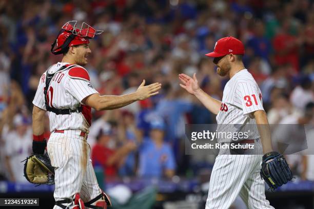 Catcher J.T. Realmuto and closer Ian Kennedy of the Philadelphia Phillies shake hands after defeating the New York Mets 4-2 in a game at Citizens...