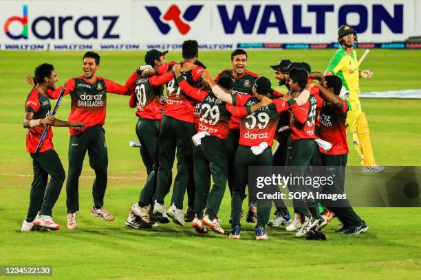 Bangladesh cricket players celebrate during the Third T20 match between Australia cricket team and Bangladesh at Sher e Bangla National Cricket...