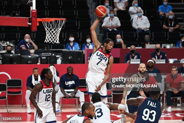 S Kevin Wayne Durant jumps for the rebound in the men's final basketball match between France and USA during the Tokyo 2020 Olympic Games at the...