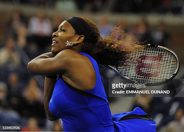 Tennis player Serena Williams returns a shot to Serbia's Bojana Jovanovski during their Women's US Open 2011 match at the USTA Billie Jean King...
