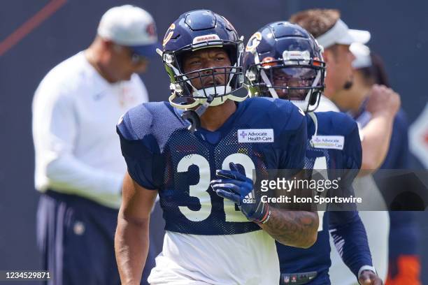 Chicago Bears running back David Montgomery warms up with a stretch during the Chicago Bears training camp on Family Fest Day at Soldier Field on...