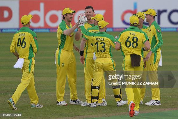 Australia's cricketers celebrate after the dismissal of Bangladesh's Soumya Sarkar during the fourth Twenty20 international cricket match between...