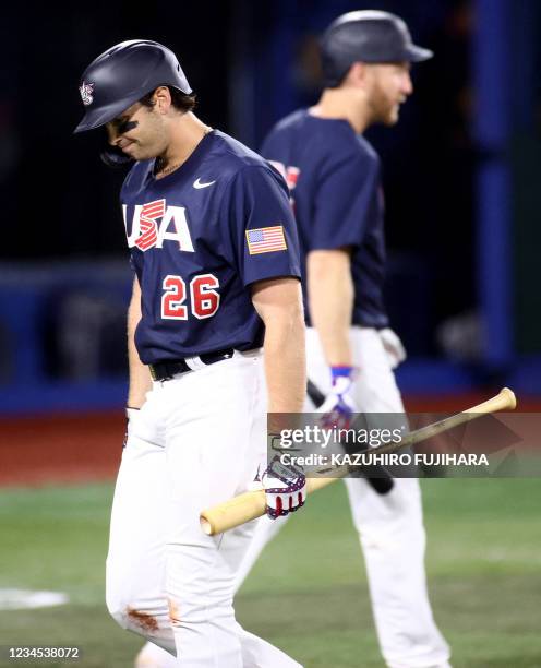 S Triston Casas walks back to dugout after strikeout during the eighth inning of the Tokyo 2020 Olympic Games baseball gold medal game between USA...