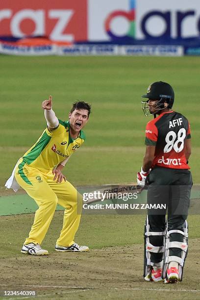 Australia's Mitchell Swepson appeals unsuccessfully for leg before wicket against Bangladesh's Mohammad Naim during the fourth Twenty20 international...