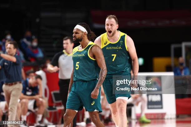 Patty Mills and Joe Ingles of the Australia Men's National Team celebrate during the game against the Slovenia Men's National Team during the Bronze...