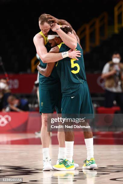 Joe Ingles and Patty Mills of the Australia Men's National Team celebrate after the game against the Slovenia Men's National Team during the Bronze...