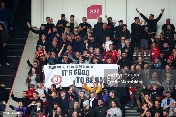 Bristol City fans hold a banner reading Its good to be back during the Sky Bet Championship match between Bristol City and Blackpool at Ashton Gate...
