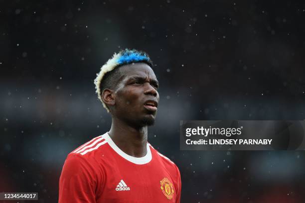 Manchester United's French midfielder Paul Pogba reacts at the final whistle of the pre-season friendly football match between Manchester United and...
