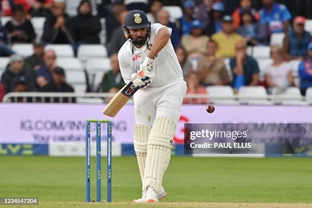 India's Rohit Sharma bats on the fourth day of the first cricket Test match of the India Tour of England 2021 between England and India at the Trent...