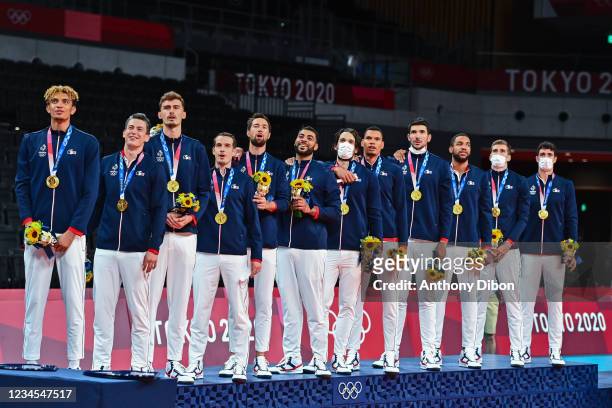 Team of France line up for the national anthem during the Men's Final match between ROC and France at Ariake Arena on August 7, 2021 in Tokyo, Japan.