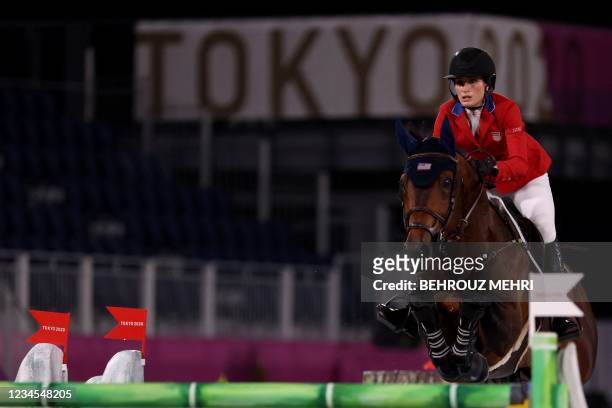 Jessica Springsteen of the US riding Don Juan van de Donkoeve in the equestrian's jumping team finals during the Tokyo 2020 Olympic Games at the...