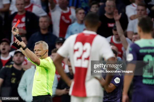 Referee Bjorn Kuipers gives a red card to Nicolas Tagliafico of Ajax during the Dutch Johan Cruijff Schaal match between Ajax v PSV at the Johan...