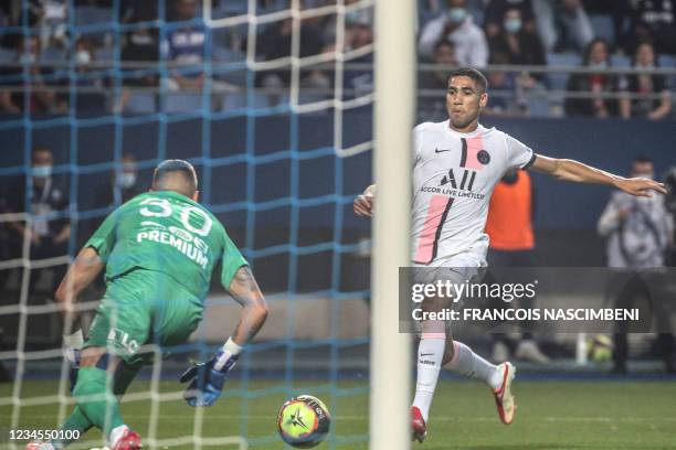 Paris Saint-Germain's Moroccan defender Achraf Hakimi shoots to score during the French L1 football match between Paris Saint-Germain and ES Troyes...