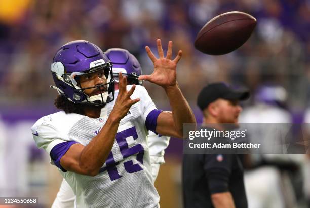 Troy Dye of the Minnesota Vikings catches the ball during practice at U.S. Bank Stadium on August 07, 2021 in Minneapolis, Minnesota.