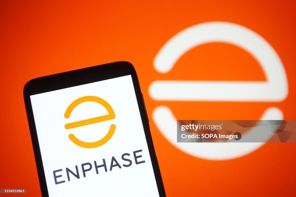 In this photo illustration an Enphase Energy logo is seen on a... News ...