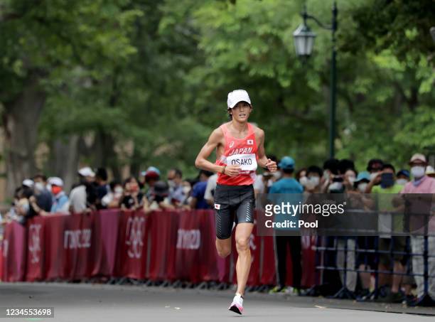 Japan's Suguru Osako competes in the men's marathon final on day sixteen of the Tokyo 2020 Olympic Games at Sapporo Odori Park on August 8, 2021 in...