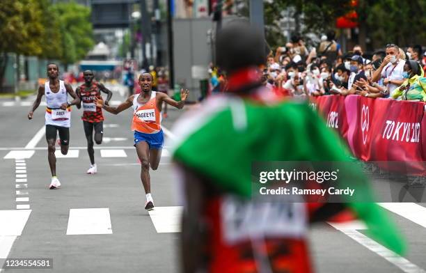 Hokkaido , Japan - 8 August 2021; Abdi Nageeye of Netherlands approaches the finish line in second place as Eliud Kipchoge of Kenya waits to greet...