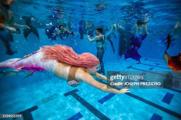 Mermen Center Mermen Photos and Premium High Res Pictures - Getty Images
