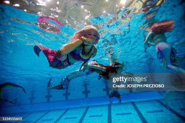 Mermen Center Mermen Photos and Premium High Res Pictures - Getty Images