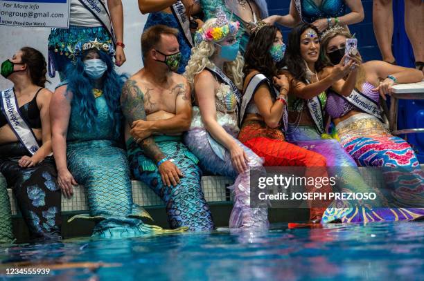 Mermen Center Mermen Photos and Premium High Res Pictures - Getty Images