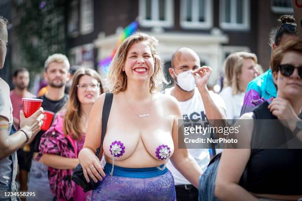 Image contains nudity) People gather at the Maarten Luther King Park to celebrate this year's Pride on August 7, 2021 in Amsterdam, Netherlands. The...