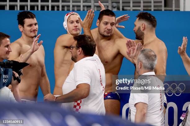 Lovre Milos, Andro Buslje, Paulo Obradovic and Marko Macan of Team Croatia reacts during the Mens Classification 5th-6th match between Croatia and...