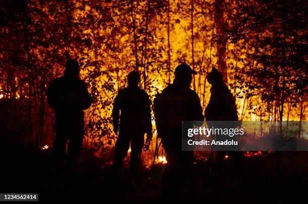 Extinguishing works continue for the wildfire in the village of Kuel in Yakutia, Sakha, Russia on August 08, 2021.