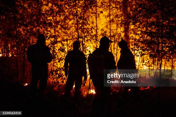 Extinguishing works continue for the wildfire in the village of Kuel in Yakutia, Sakha, Russia on August 08, 2021.