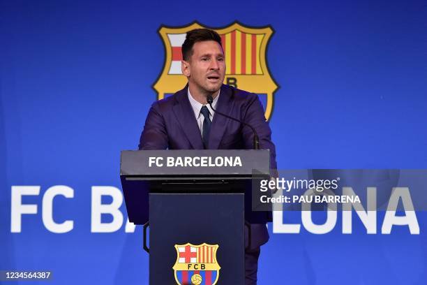 Barcelona's Argentinian forward Lionel Messi cries during a press conference at the Camp Nou stadium in Barcelona on August 8, 2021. - The six-time...